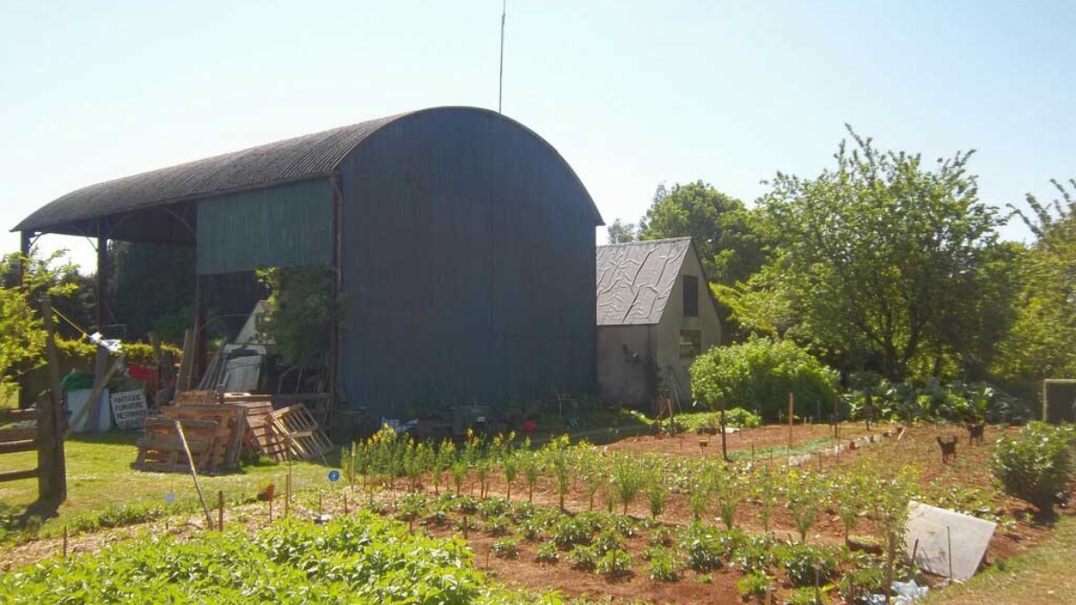 A barn and vegetable plot.