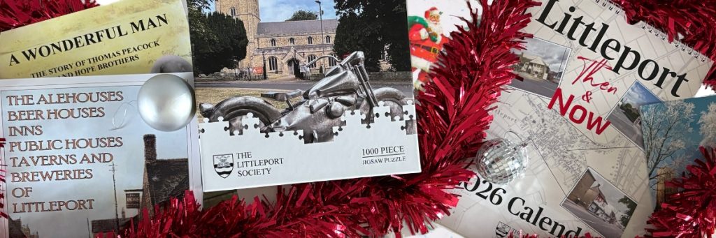 Books, calendar, jigsaw with tinsel and baubels.