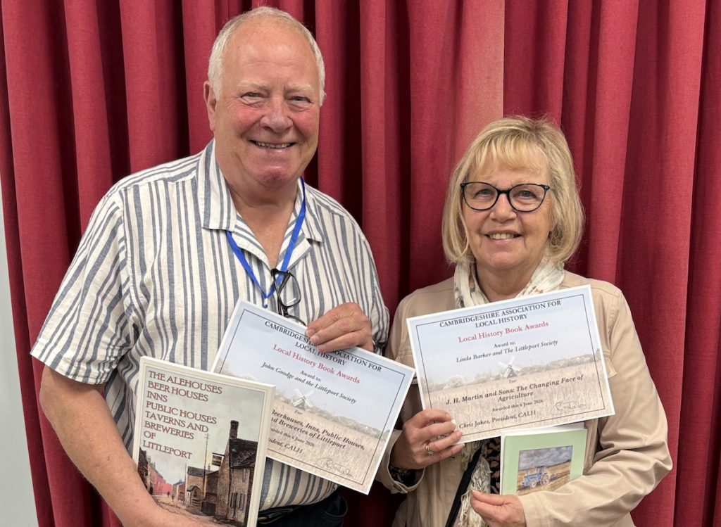 John and Linda with their awards from the Cambridgeshire Association for Local History (CALH). Source: The Littleport Society